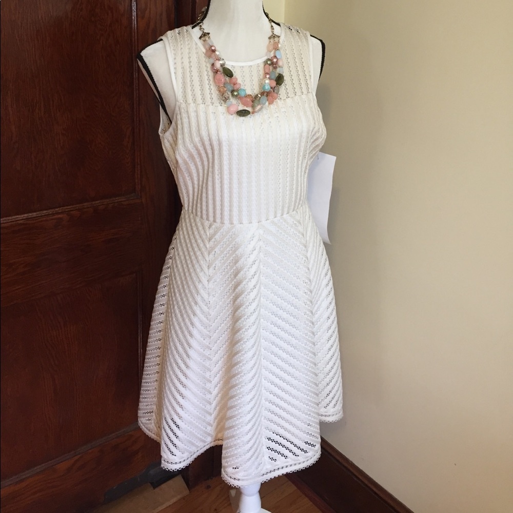 Guess size 12 cream colored dress with texture