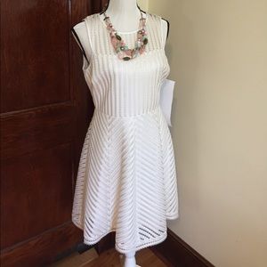 Guess size 12 cream colored dress with texture