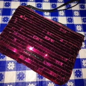 BCBG pink sequin wristlet SALE