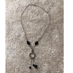 Long, stylish necklace with black beading