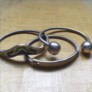 Three silver bracelets