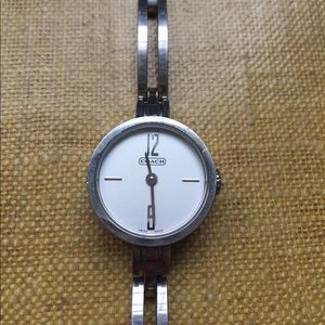 Delicate Silver Coach Watch