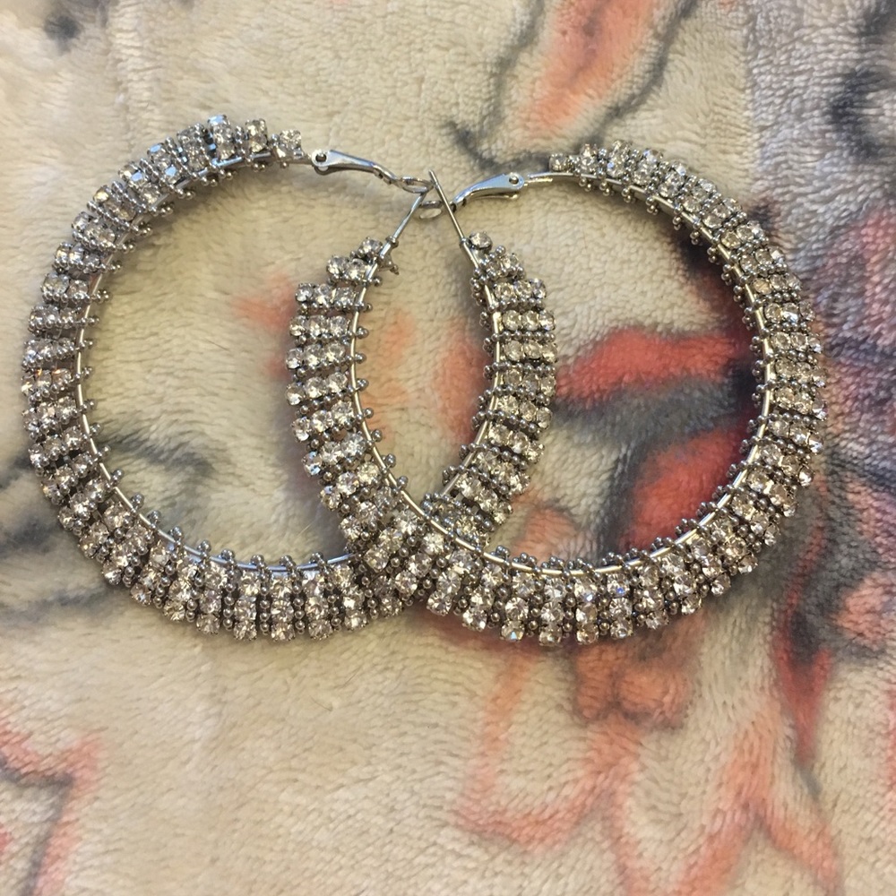 Beautiful medium sized diamond  hoop earring