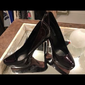 Boutique 9 brand shoes, size 7. Eggplant color