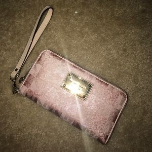 Brand new Michael Kors rose gold wallet wristlet