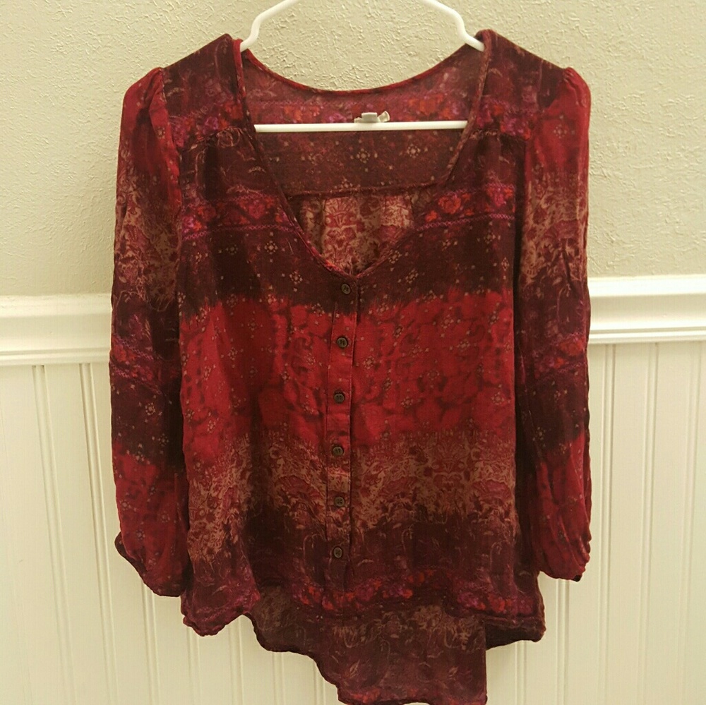 Beautiful flowy button blouse with a high low back
