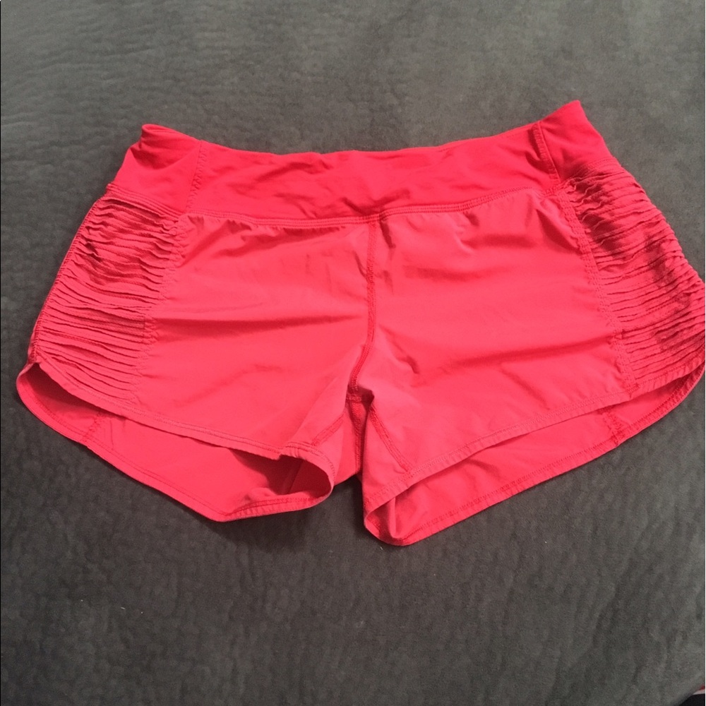 Red lululemon run bright at night