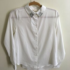 White long sleeved button down shirt