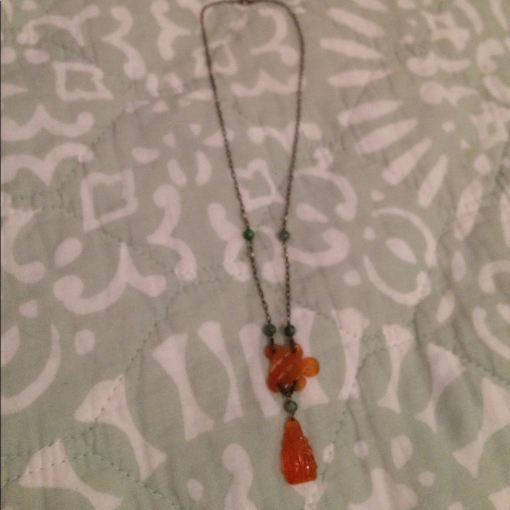 Carved Buddha necklace