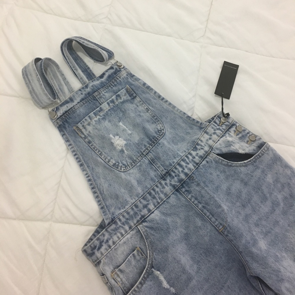 Light washed ripped Overalls