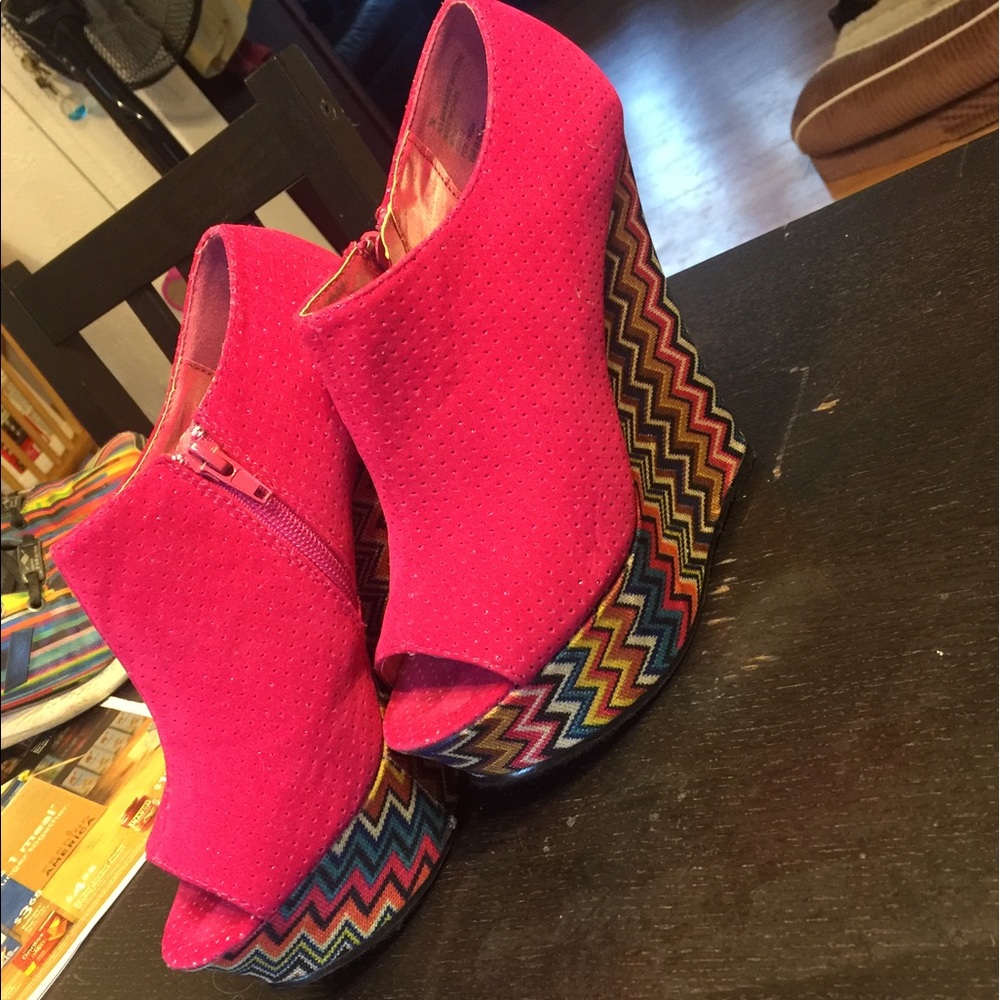 Pink wedges with colorful bottoms