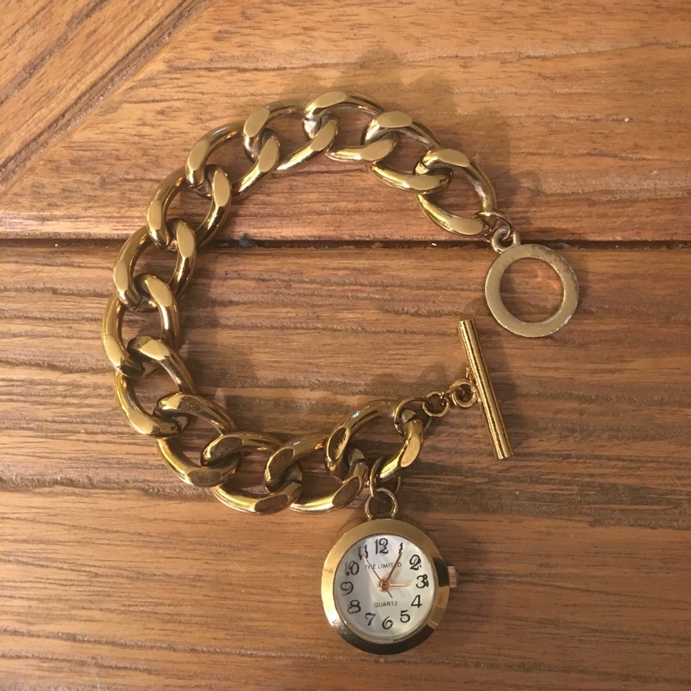 Gold chain bracelets with watch detail