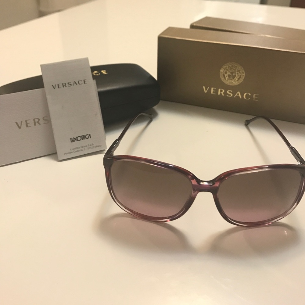 Versace sunglasses with original box never used