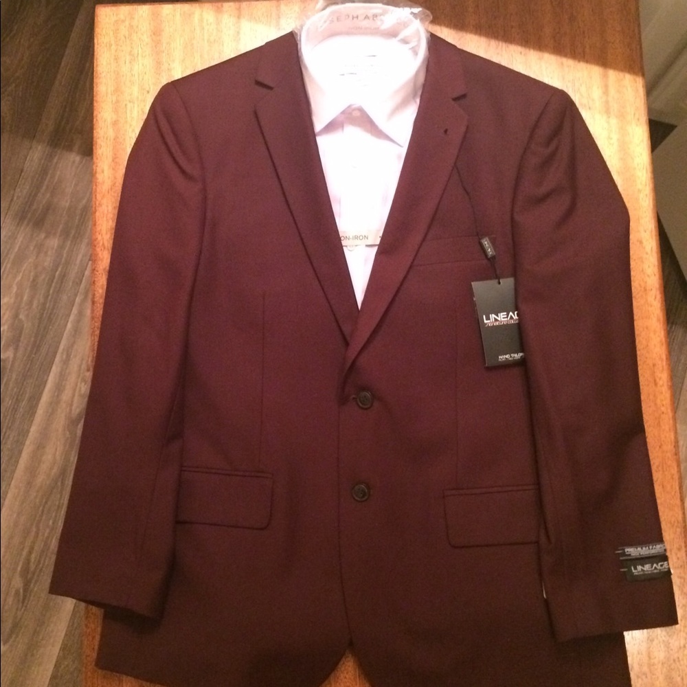 Burgundy Colored Suit ( Size 40 S ).