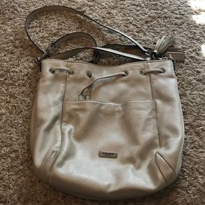 Coach cross body top sinch purse.