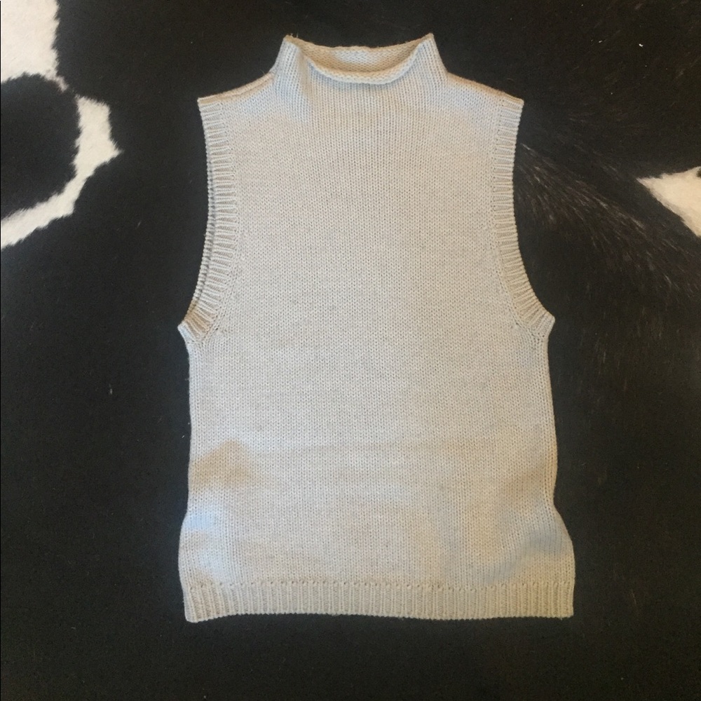 Calvin Klein sleeveless sweater.