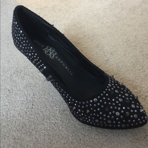 Black with spikes high heels.