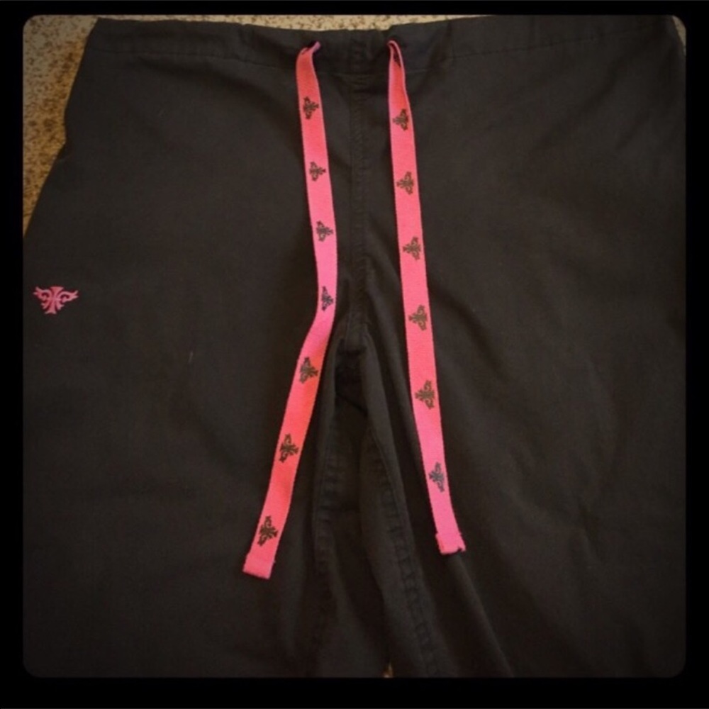 Med Couture black scrub bottoms.