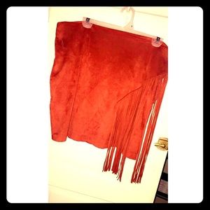 Suede skirt with fun fringe detail!