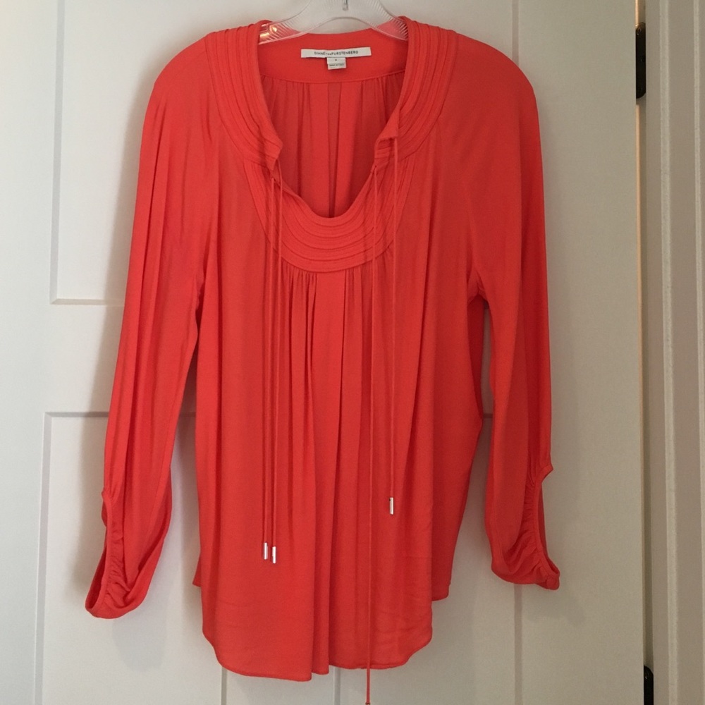 Diane von Furstenburg orange blouse