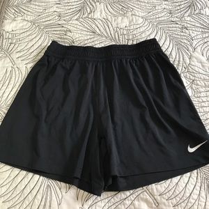 Black Wonens Nike Dri-Fit Shorts.