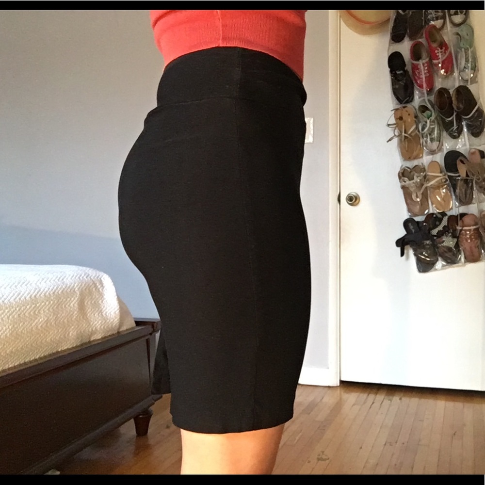 Above the knee black skirt with back slit