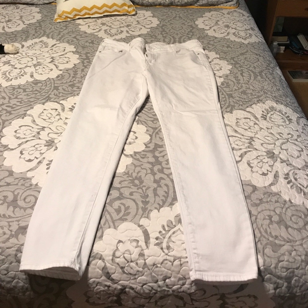 Old navy rockstar mid-rise white jeans.