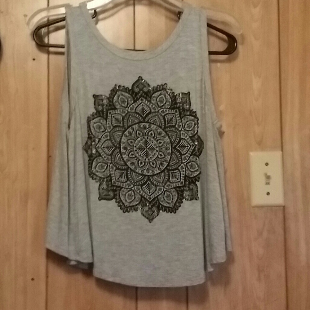 . Cute tank top for sale! Cute flower design.