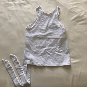 Sports top with mesh and tie