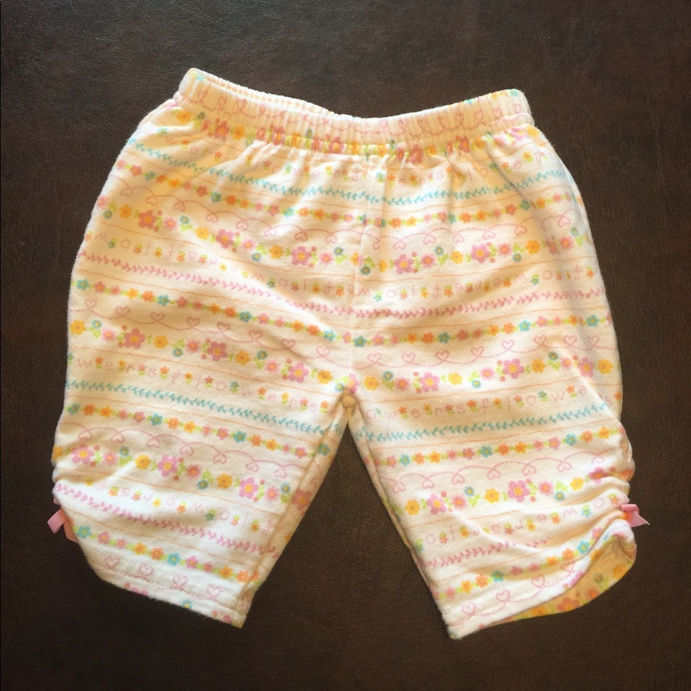 Flower print pants with side bow detail.