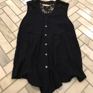 Anthropologie navy Swiss dot sleeveless top.