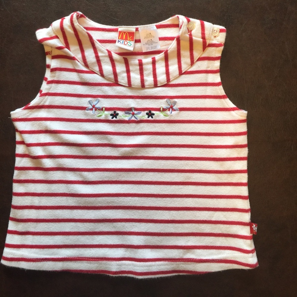 Red/white striped shirt.