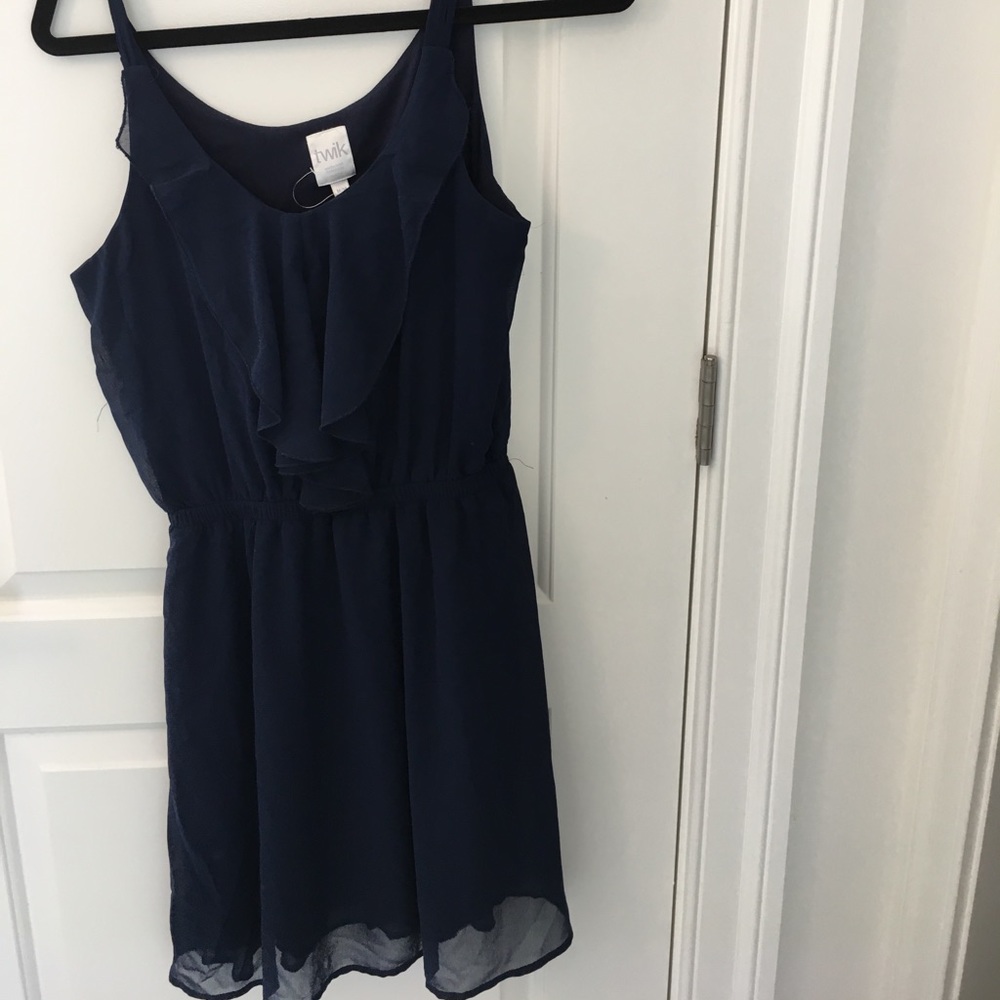 Twik Canada navy dress with ruffle, worn once.