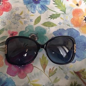 Tory Burch Sunglasses 😎Dark blue but looks black.