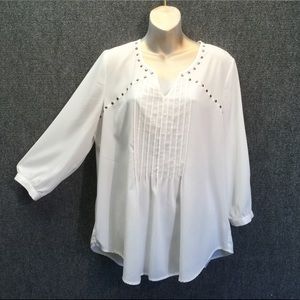 Creme sheer dressy long sleeve embellished top.