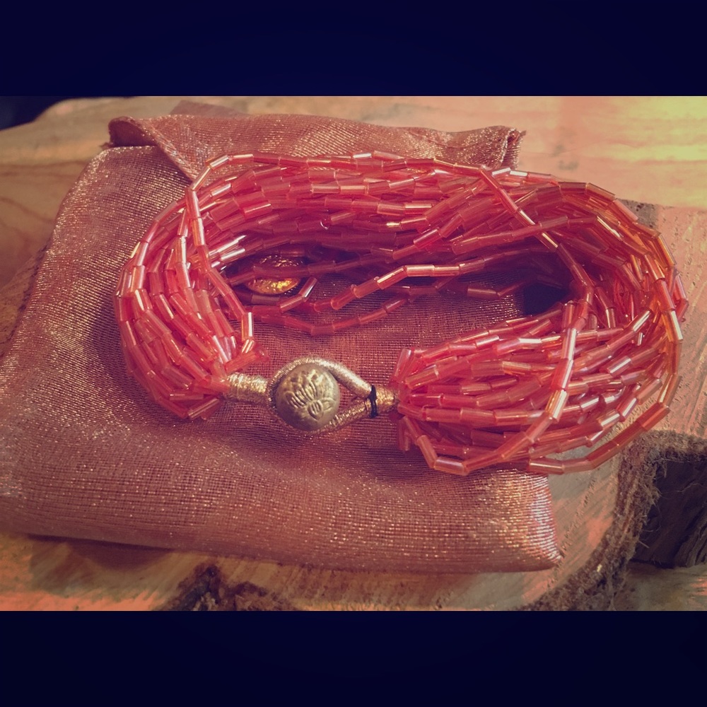 Orange beaded multistrand bracelet