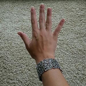 Silver flower bracelet with gemstones