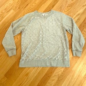 GAP pullover sweatshirt with eyelet detail.