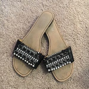 Slip on black and white Nine West sandals size 6