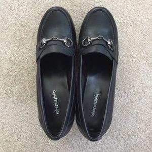 Only worn once! Black heels with silver buckle