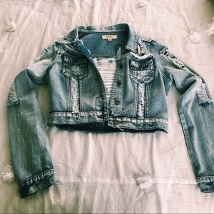 Distressed jean jacket size small