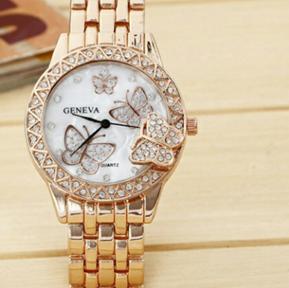 Rose colored butterfly watch