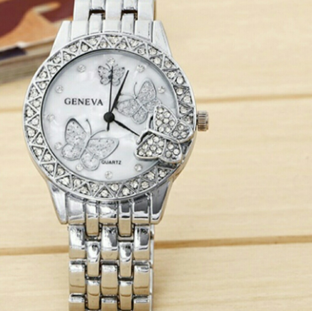Silver butterfly watch