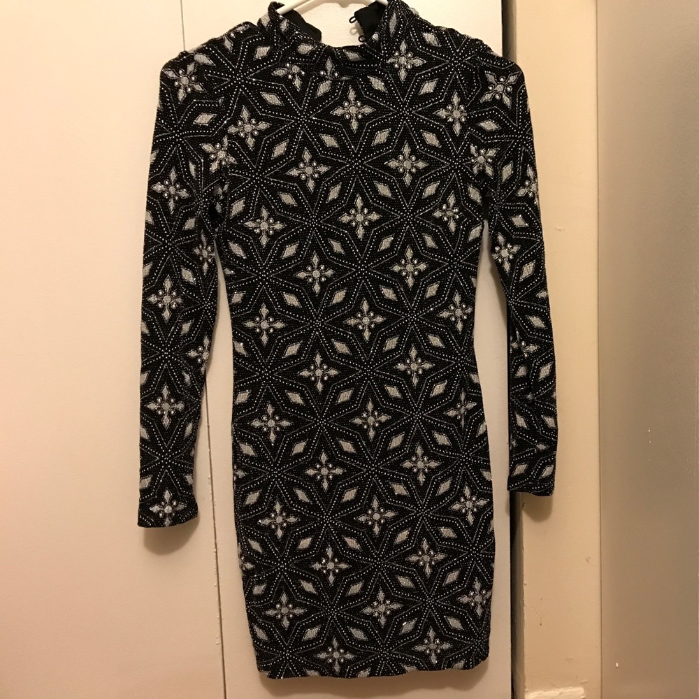 Fitted sparkly white and black dress