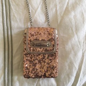 Nine West phone wallet with a chain
