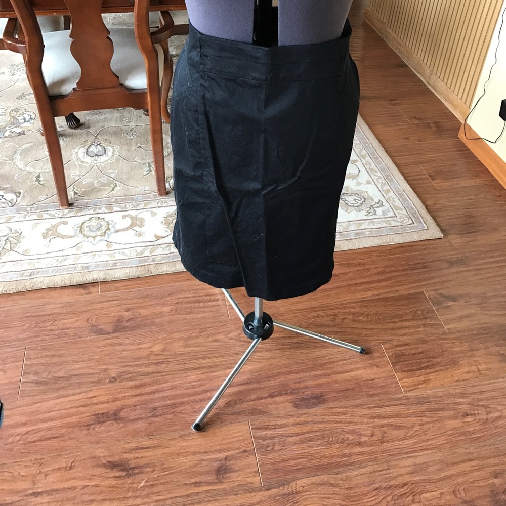 Knee length black pencil skirt