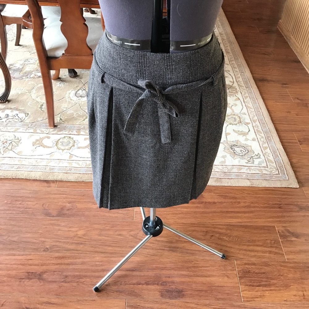 Knee length plaid, pleated skirt