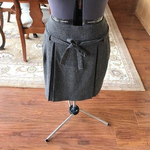 Knee length plaid, pleated skirt