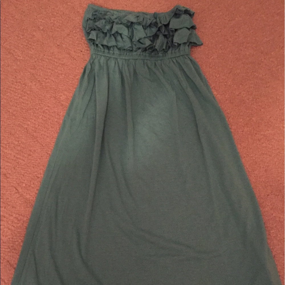 Teal colored sundress with ruffled top.