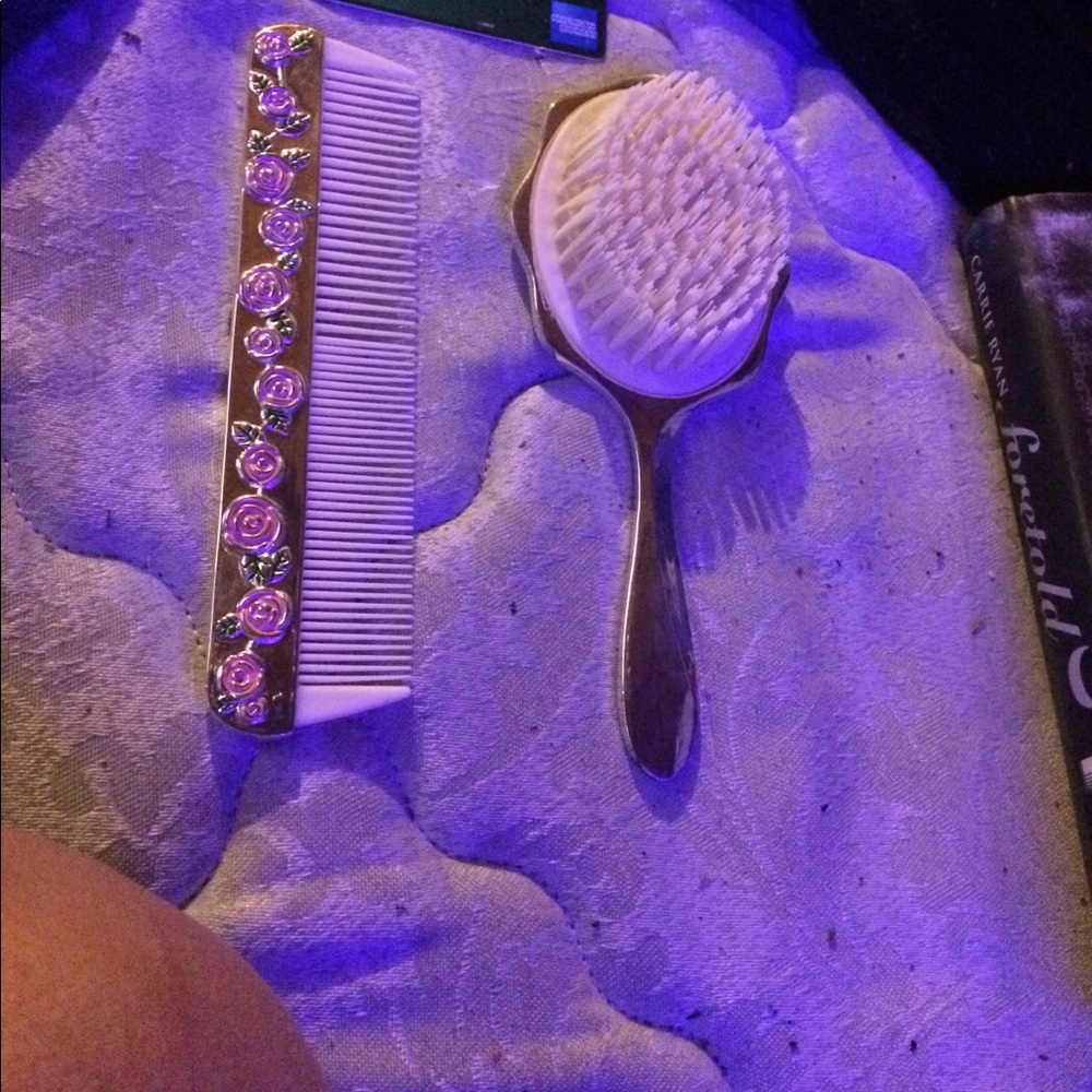 Metal brush and comb with pink flowers